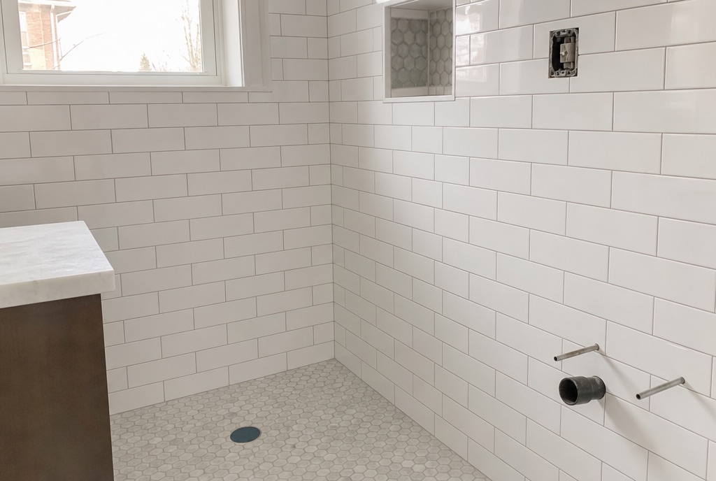 Freshly tiled bathroom showing completed work